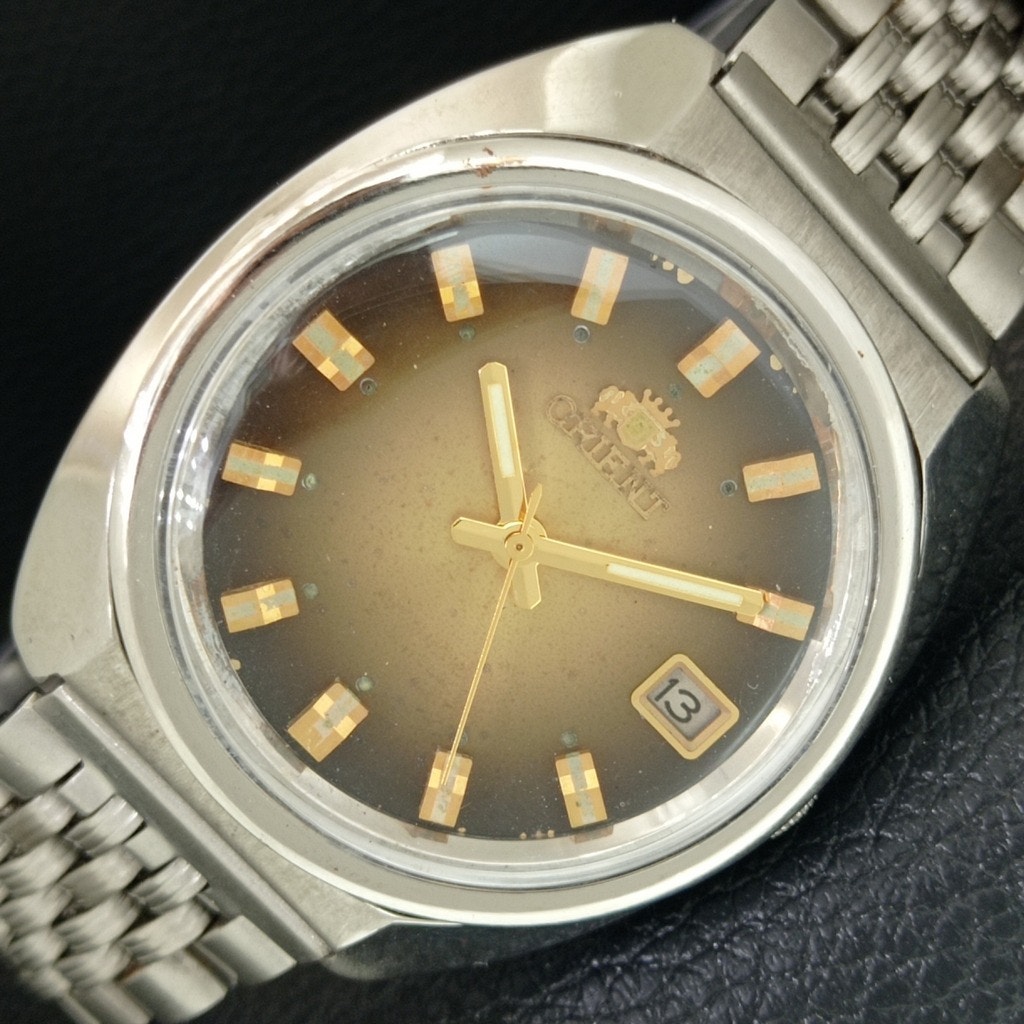 Vintage 1988 Orient Automatic Mens Silver Watch WDaydate  Gold Accents
